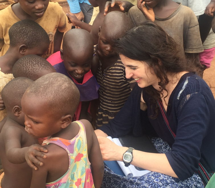 Children and team mentor playing with tablet to take selfies